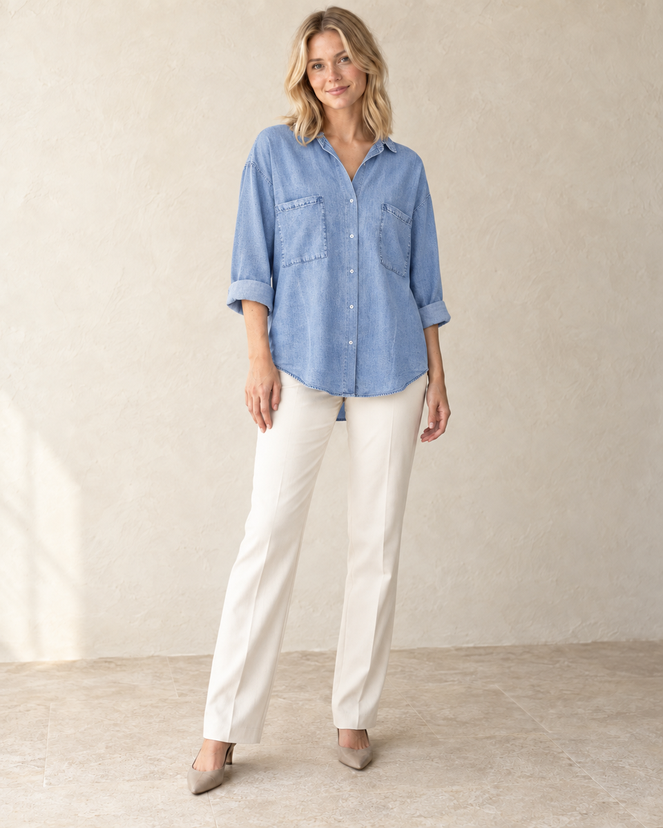 The Relaxed Denim Shirt — Denim Blue front view