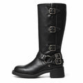 Black multi-buckle boot side profile and low block heel