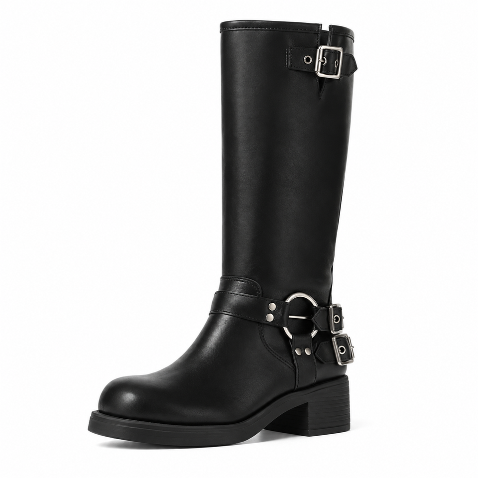 Black single-buckle boot with harness ring and double ankle straps on white background