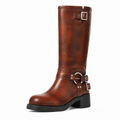 Reddish Brown single-buckle boot with harness ring and double ankle straps on white background