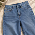 The High-Rise Straight Jean — Mid Blue — garment detail