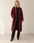 The Longline Textured Coat — Burgundy — studio view