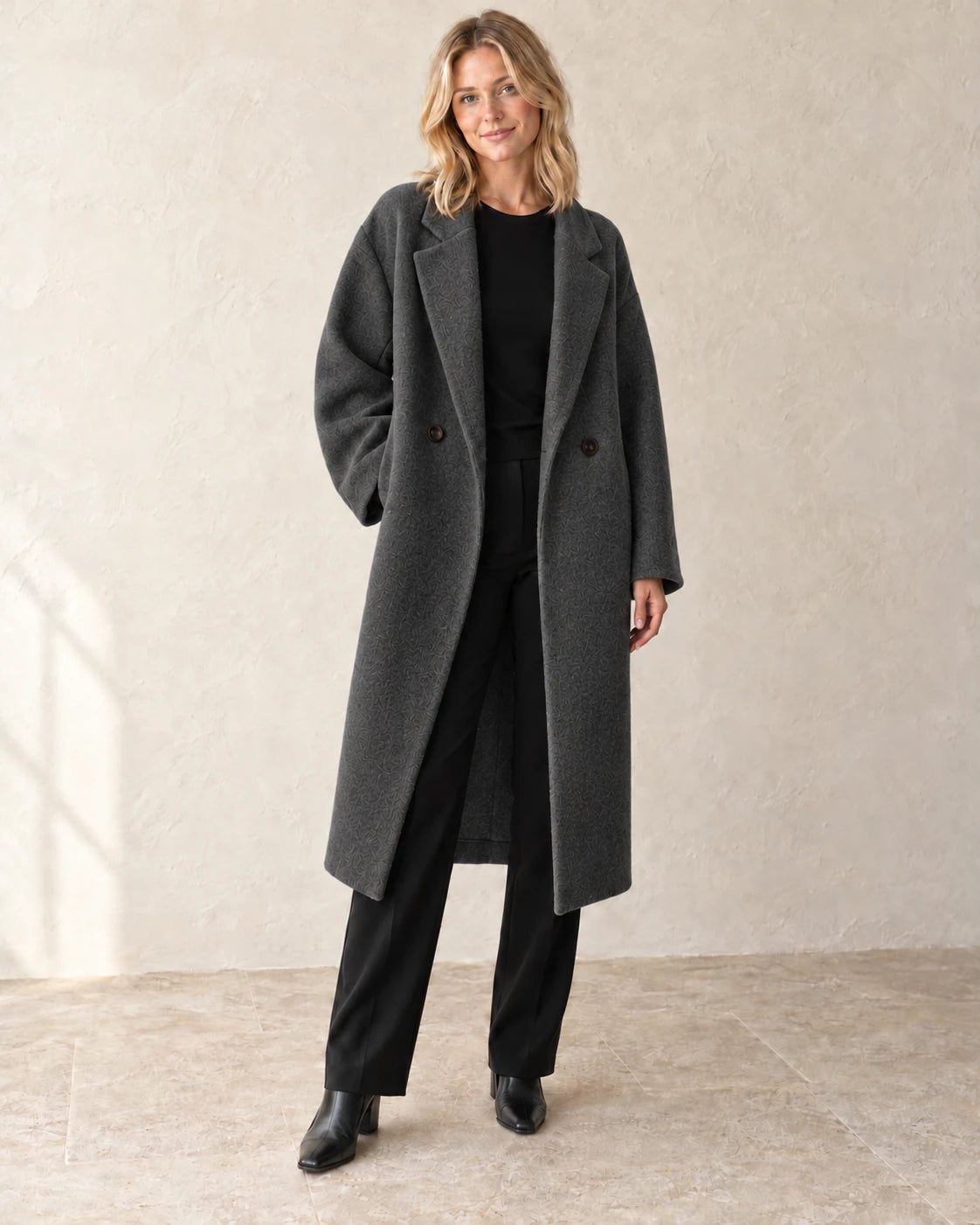 The Longline Textured Coat — Charcoal — studio view