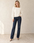 The Relaxed Boatneck Knit — Ivory — studio view
