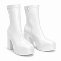 White sculpted platform ankle boots — hero