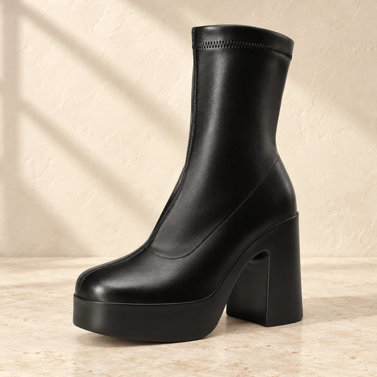 Black sculpted platform ankle boots — collection