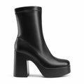 Black sculpted platform ankle boots — profile