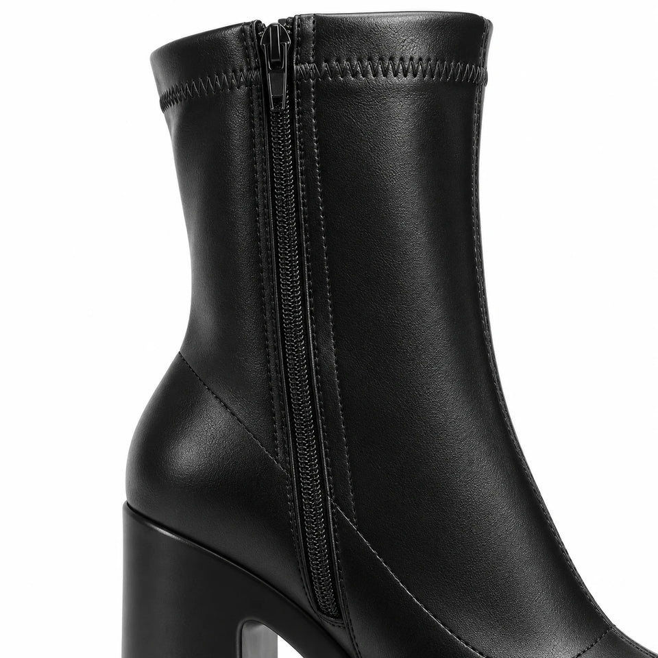 Black sculpted platform ankle boots — zip detail