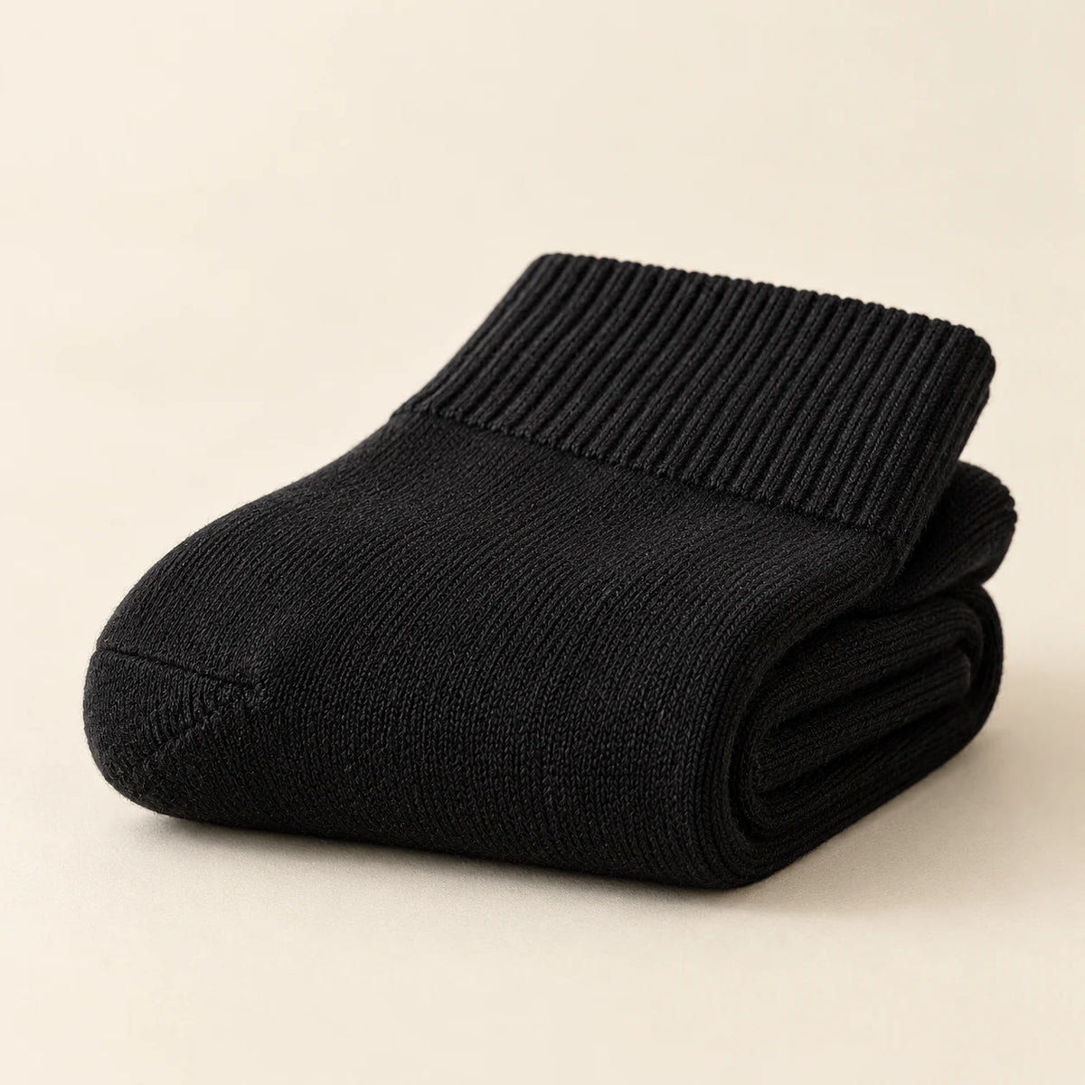 Black socks folded to show knit texture