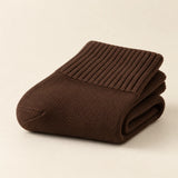 Coffee socks folded to show knit texture
