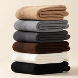 Six available colours of Aveleya brushed crew socks, folded