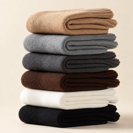 Six available colours of Aveleya brushed crew socks, folded