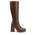 profile — knee-high platform boots