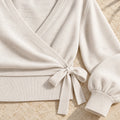 The Wrap-Tie Knit — Ivory — garment detail